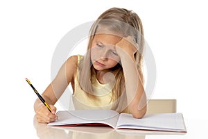 Young school student girl looking unhappy and tired in education concept