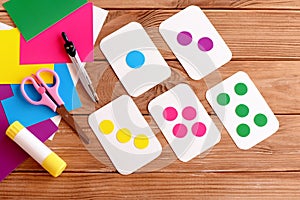 Education flash cards for kids. Learning colours. Teaching kids to count. Scissors, pencil, glue, colored cardboard sheets