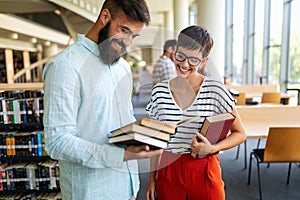 Education friendship people concept. Group of happy students learning together in college library