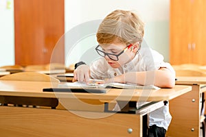 Education, high school, college. Portrait of a funny shouting student boy standing by a school blackboard