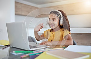 Education, laptop and girl learning a virtual class from her kindergarten teacher via an educational online website