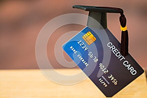 Education payment Credit Card for study Graduate concept: Graduation Cap on Mock up Card, Idea for dept loan playing for successs