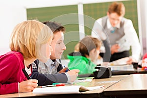 Education - Pupils and teacher learning at school