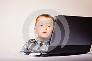 Education, technology internet - little boy with laptop