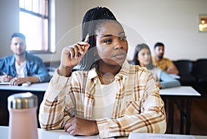 Education, university and black woman thinking in classroom, learning and listening during a lecture. Students, college