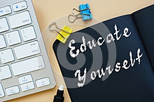 Educational concept about Educate Yourself with sign on the piece of paper