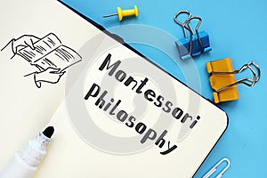 Educational concept about Montessori Philosophy with phrase on the piece of paper