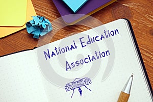 Educational concept about National Education Association with inscription on the sheet