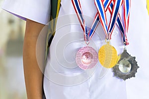 Educational examinations, silver medals, bronze medals.