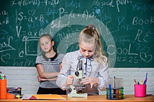 Educational experiment. Back to school. School classes. Girls study chemistry in school. Biology and chemistry lessons