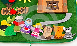 Educational felt book with wooly fairy tale toys for little children. Leisure and early development