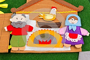 Educational felt book with wooly fairy tale toys for little children. Leisure and early development concept