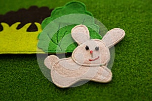 Educational felt book with wooly fairy tale toys for little children. Leisure and early remote development, social distance