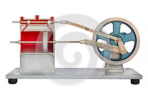 Model of the inside of a car motor engine with piston isolated on white