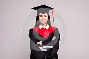Educational theme. Graduating student girl in an academic gown. Isolated over white background