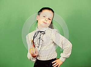 Educative experiment. Chemistry fun. Schoolgirl with colorful chemical liquids. Having fun with chemistry. Education