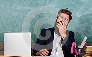 Educators more stressed at work than average people. High level fatigue. Educator bearded man yawning face tired at work