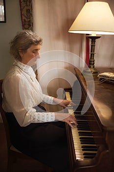 Edwardian lady playing music