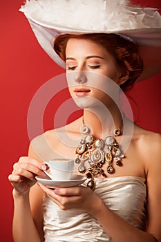 Edwardian women with cup