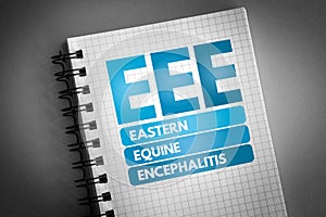 EEE - Eastern Equine Encephalitis acronym on notepad, medical concept background