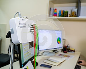 EEG monitor cable. Doctor near medical technic. Accessory for Electroencephalography machine. photo