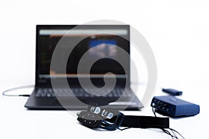 EEG neurofeedback headset and computer. Electroencephalography concept on white background.