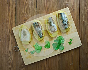 Eel with baked potatoes photo