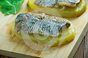 Eel with baked potatoes photo