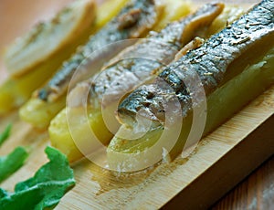 Eel with baked potatoes photo