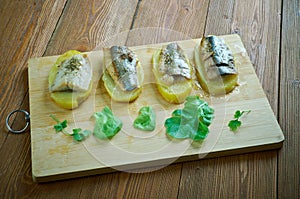 Eel with baked potatoes photo