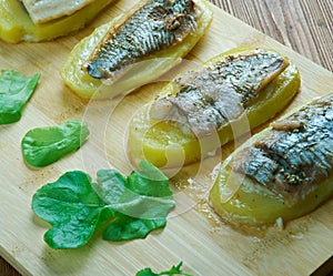 Eel with baked potatoes photo