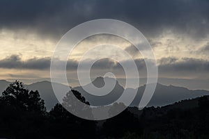 Eerie dawn in desert mountains