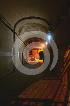 Eerie desert gate illuminated by rare light bulbs