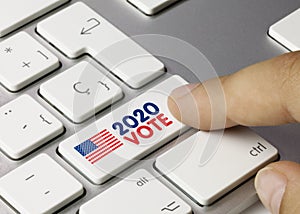 EEUU 2020 VOTE - Inscription on White Keyboard Key photo