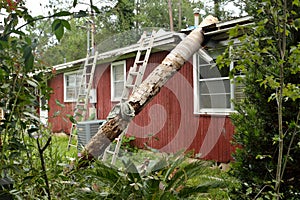 EF0 tornado damage on house roof