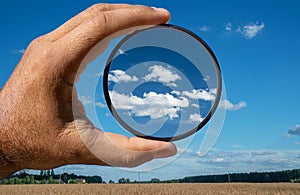 Effect of a polarizing filter shown on the photo of the sky. The picture of the clouds is higher contrast through the filter photo