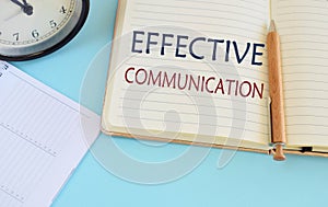 Effective Communication text written in notebook. Concept eaning the ability to convey information to another effectively and