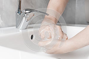 Effective handwashing techniques: rub palm with back of other hand`s fingers. Hand washing is very important to avoid the risk of