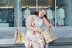 The Effects of Shopping on Mental Health. Understanding Compulsive Shopping Disorder. Shopaholic woman after multiple