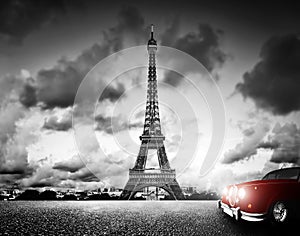 Effel Tower, Paris, France and retro red car. photo