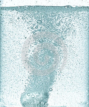 Effervescent dissolving fizzy tablet in water