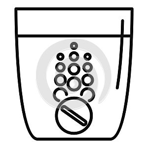 Effervescent tablet dissolving in a glass of water