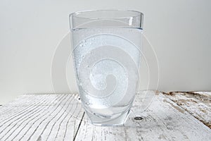 Effervescent tablet in a glass of water