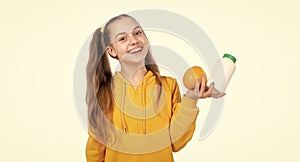 effervescent tablet for kids. happy girl presenting vitamin c. organic food supplement.
