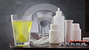 Effervescent tablet vitamin C fall and dissolves in glass with water. Prevention arvi or flu