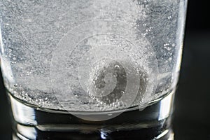 effervescent tablets with a glass of water