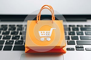 Effortless online shopping paper bag on laptop, seamless experience