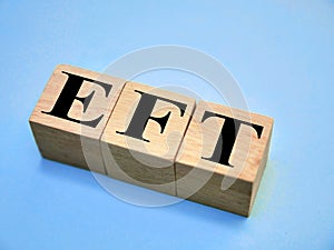 EFT, text words typography written with wooden letter, life and business motivational inspirational
