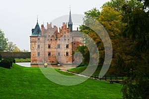 Egeskov, Denmark, Europe: Egeskov castle slot landmark fairy tale castle in Funen Denmark view from the garden