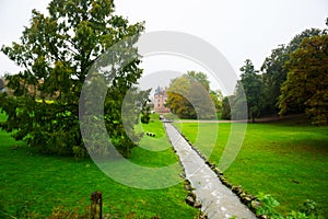 Egeskov, Denmark, Europe: Egeskov castle slot landmark fairy tale castle in Funen Denmark view from the garden